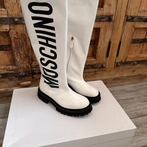 Moschino White Logo Boots with Black Lug Sole